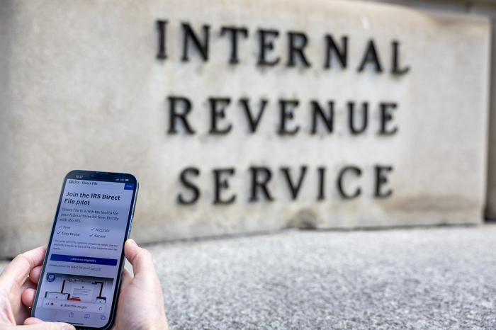 WASHINGTON, DC - APRIL 05: People use IRS Direct File at the Internal Revenue Service Building on April 05, 2024 in Washington, D.C. 