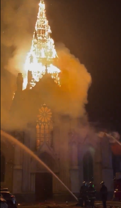 Flames engulf the Church of the Immaculate Conception in the town of Saint-Omer near Calais, France, 