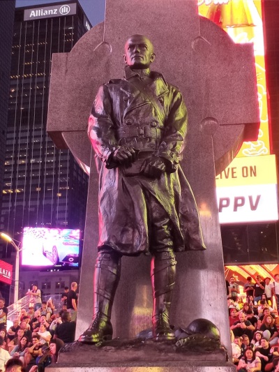 A statue of Father Francis Duffy (1871-1932), a Catholic priest and United States Army chaplain who served in World War I, located at Times Square in New York City. 