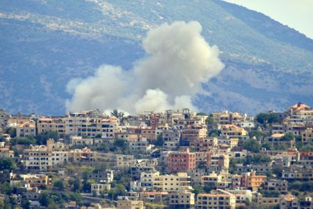 Smoke billows from the site of an Israeli airstrike in the southern Lebanese village of Khiam near the border on September 19, 2024. Lebanon's Hezbollah has traded near-daily fire with Israeli forces in support of ally Hamas since the Palestinian militant group's October 7 attack triggered war in the Gaza Strip, with repeated escalations during more than 11 months of the cross-border violence.