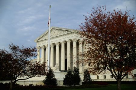 The U.S Supreme Court building is framed by fall foliage on Nov. 6, 2015, in Washington, D.C.