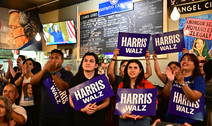 Supporters of the Latinos for Harris-Walz campaign attend a party to watch U.S. Vice President and 2024 Democratic presidential candidate Kamala Harris delivering her acceptance speech in Los Angeles on Aug. 22, 2024, the fourth and last day of the Democratic National Convention (DNC). Harris formally accepted the party's nomination for president at the DNC which ran from Aug. 19-22 in Chicago. 