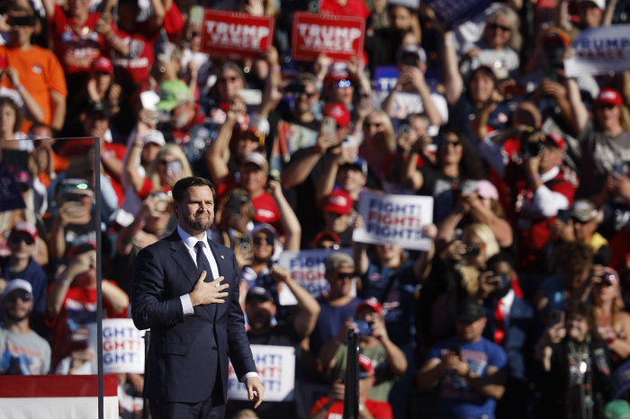 Republican vice presidential candidate Sen. JD Vance takes the stage during a campaign rally at the Butler Farm Show grounds on Oct. 05, 2024, in Butler, Pennsylvania. This is the first time that Republican presidential nominee, former President Donald Trump, has returned to Butler since he was injured during the first of two attempted assassinations on July 13. 