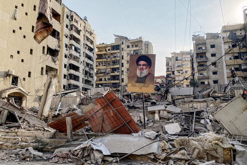 A portrait of slain Hezbollah leader Hassan Nasrallah sits amids debris at Beirut's southern suburb Rouweiss neighbourhood on Oct. 10, 2024, following overnight Israeli strikes. The United States urged its ally Israel to avoid Gaza-like military action in Lebanon, after Prime Minister Benjamin Netanyahu said it could face 