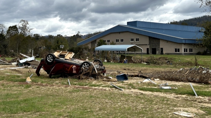 An overturned vehicle remains where flood waters carried it on the campus of Asheville Christian Academy in Swannanoa, N.C., on Oct. 15, 2024.