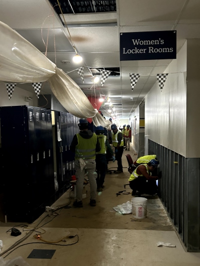 Workers with ServiceMaster Recovery Management clean out the flood-damaged high school building on the campus of Asheville Christian Academy in Swannanoa, N.C., on Oct. 15, 2024. Water in this building reportedly reached hip-high.