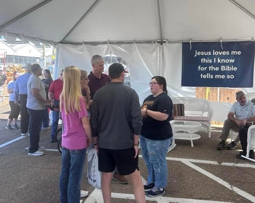 Volunteers with the Mississippi Baptist Convention Board evangelize attendees of the Mississippi State Fair at Jackson, Mississippi, in October 2024.