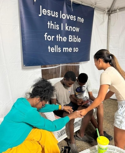 Volunteers with the Mississippi Baptist Convention Board evangelize attendees of the Mississippi State Fair at Jackson, Mississippi, in October 2024. 