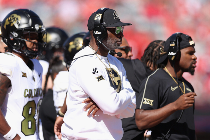 Head coach Deion Sanders of the Colorado Buffaloes watches from the sidelines during the first half of the NCAAF game against the Arizona Wildcats at Arizona Stadium on October 19, 2024, in Tucson, Arizona . 