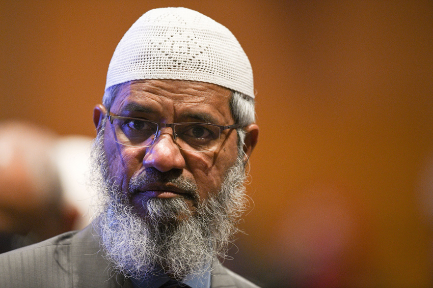 Controversial Indian Islamic preacher Zakir Naik arrives during the opening ceremony of the Kuala Lumpur Summit 2019 in Kuala Lumpur on Dec. 19, 2019.