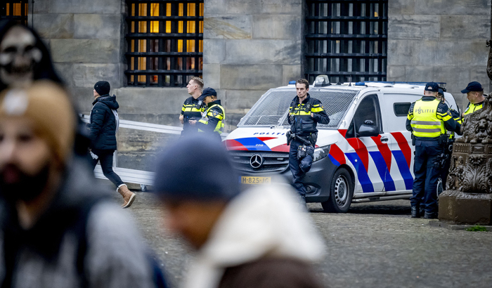 Netherlands' Police officers patrol on Dam Square in Amsterdam, on Nov. 9, 2024. Extra security measures were taken in Amsterdam following violent clashes on Nov. 7, 2024, between fans of Ajax, Maccabi Tel Aviv and Turkish club Fenerbahce, who were playing another Dutch club, AZ Alkmaar. The city has a introduced a temporary ban on demonstrations throughout the capital this weekend and has also been designated a security risk area.