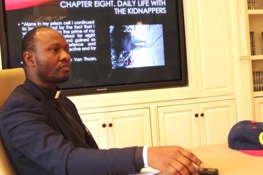 Father Stephen Ojapah shares the story of his kidnapping during a Religious Freedom Roundtable briefing on Nov. 25, 2024, at The Public Affairs Office Building of The Church of Scientology in Washington, D.C.