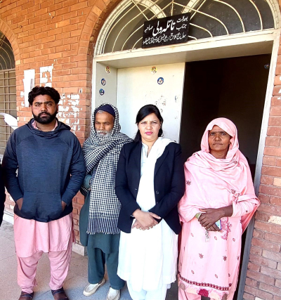 Sufyan Masih (L) with parents and counsel after court hearing in Punjab Province, Pakistan. 