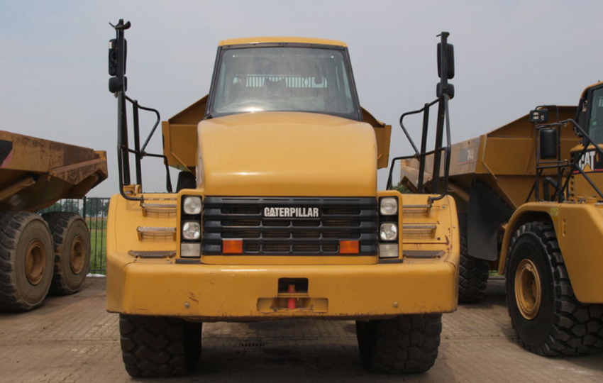 The Caterpillar logo appears on construction equipment manufactured by the company.