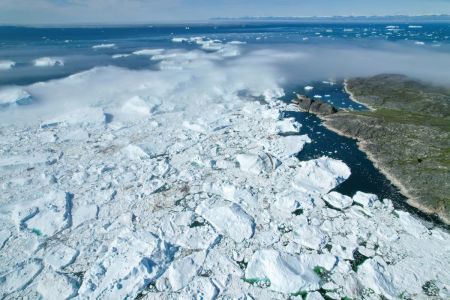 Aerial view of Jakobshavn Glacier at Disko Bay, Greenland.