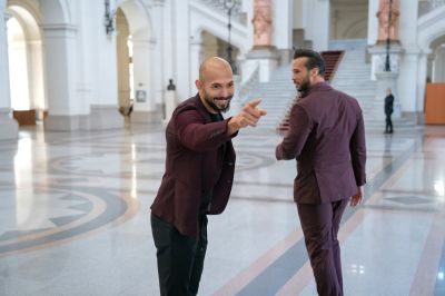 Andrew Tate (left) poses for a photo next to his brother Tristan Tate while entering the Court of Appeal on October 15, 2024 in Bucharest, Romania. Social Media Influencer Andrew Tate and his brother Tristan are appearing in court to appeal a decision to proceed with their trial on charges of rape, human trafficking and forming a criminal gang to exploit women. The Tate brothers were arrested on December 29, 2022, alongside Georgiana Naghel and Luana Radu as part of an investigation into human trafficking and rape.