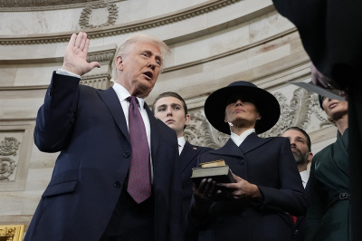 Donald Trump is sworn in as the 47th president of the United States by Chief Justice John Roberts as first lady Melania Trump holds the Bible in the U.S. Capitol Rotunda in Washington, D.C., on Jan. 20, 2025. Donald Trump takes office for his second term as the 47th president of the United States.