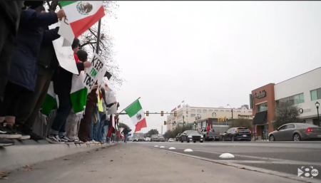 Protesters wave Mexican flags during a demonstration in Dallas, Texas on Sunday, Jan. 26, 2025.