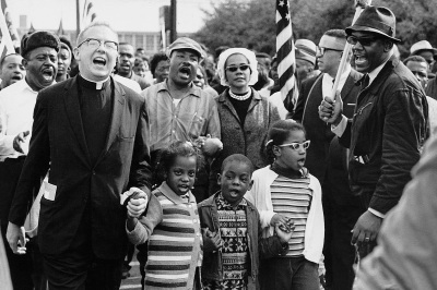 Civil rights activists lead the 1965 Selma march. Activists in the photo include white Unitarian minister James Reeb, the Rev. Martin Luther King, Jr., Coretta Scott King, the Rev. Ralph David Abernathy. 