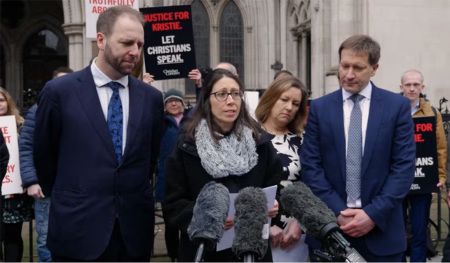 Kristie Higgs with supporters during legal process of contesting her dismissal. 