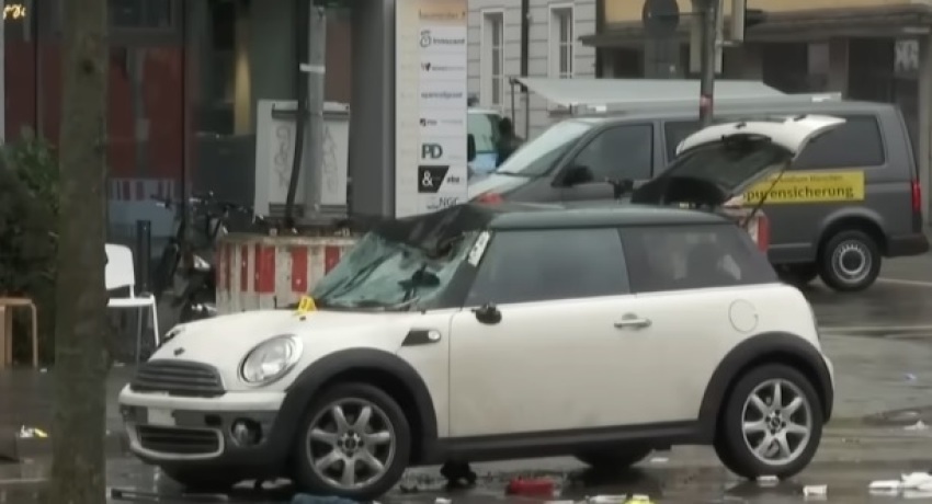 A car sits at the scene in Munich, Germany, on Feb. 13, 2025, after dozens were injured in an apparent attack that prosecutors say may have had an "Islamist" motive.