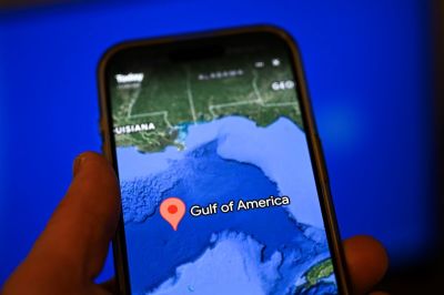 This photo illustration shows the "Gulf of America" displayed on the Google Earth application on a smartphone on February 11, 2025, in Washington, DC. Google on February 10, 2025, changed the name of the Gulf of Mexico to "Gulf of America" for those using its Maps platform inside the United States, complying with an executive order by President Donald Trump. 