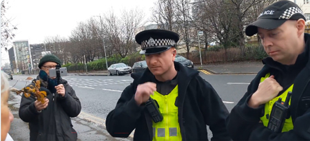 Rose Docherty, who is identified as a pro-life grandmother, is stopped from silently praying near an abortion clinic which police said is a violation of the country's “buffer zone” law. 