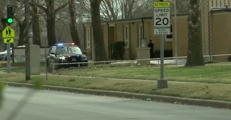 A police car is outside of Saint Patrick Catholic Church of Wichita, Kansas, in March 2025, shortly after the congregation discovered vandalism inside the sanctuary.
