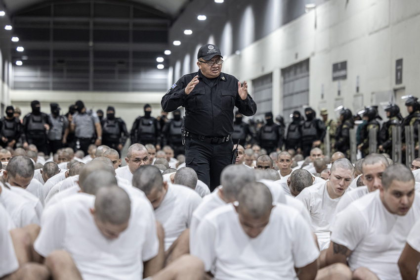 In this handout photo provided by the Salvadoran government, a guard gives directions to the inmates allegedly linked to criminal organizations at CECOT on March 16, 2025, in Tecoluca, El Salvador. Trump's administration deported 238 alleged members of the Venezuelan criminal organizations Tren De Aragua and Mara Salvatrucha with only 23 being members of the Mara. Nayib Bukele, the president of El Salvador, announced that his government will receive the alleged members of the gang to be taken to CECOT. On February of 2023 El Salvador inaugurated Latin America's largest prison as part of President Nayib Bukele's plan to fight gangs. 