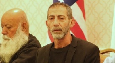 Ilan Dalal (R), the father of hostage Guy Gilboa-Dalal, describes during a panel discussion what his son has endured. The event took place in Washington, D.C., on March 11, 2025. 