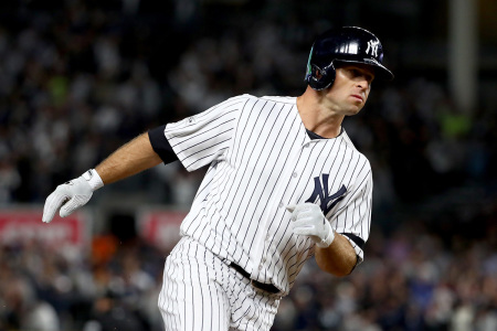 Brett Gardner #11 of the New York Yankees rounds the bases after hitting a home run against Ervin Santana #54 of the Minnesota Twins during the second inning in the American League Wild Card Game at Yankee Stadium on Oct. 3, 2017, in the Bronx borough of New York City. 