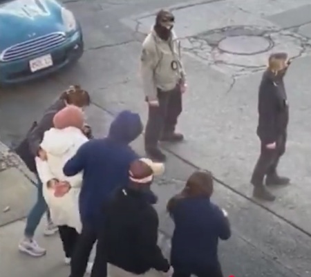 Close circuit television footage shows Rumeysa Ozturk (white jacket), a 30-year-old graduate student from Turkey, being arrested on March 25, 2025. Authorities accused her of violating the terms of her student visa by allegedly supporting Hamas.