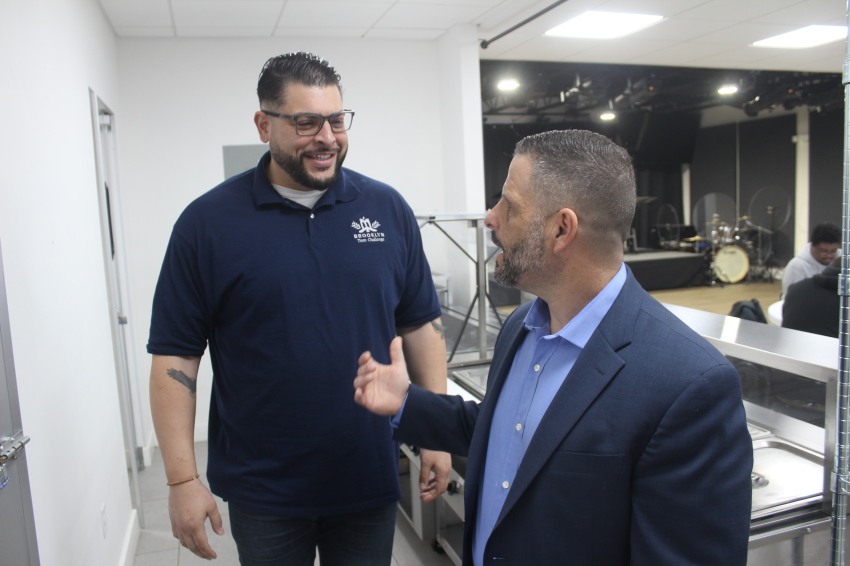 Rev. Paul Burke (L) executive director of Brooklyn Adult & Teen Challenge chats with the organization's public relations & advancement coordinator, Pastor Michael La Pietra.