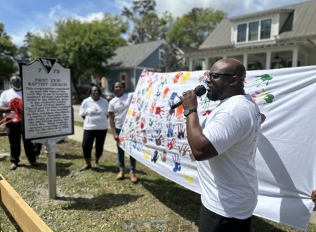 Members of First Zion Missionary Baptist Church of Bluffton, South Carolina, unveil a historical marker in honor of their church at an event held on April 5, 2025.