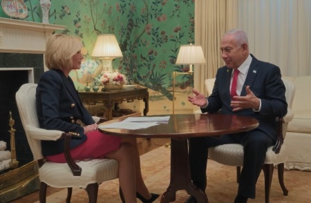 Israel Prime Minister Benjamin Netanyahu (R) speaks with Paula White-Cain (L), the senior advisor to the White House Faith Office, duiring an interview published by Daystar on April 11, 2025. 