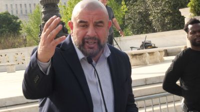 Wael Elkoshairi, a Muslim parent, speaks during a rally outside of the U.S. Supreme Court on April 22, 2025, the day the court heard oral arguments for the case "Mahmoud v. Taylor."