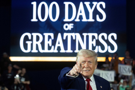 President Donald Trump arrives to deliver a speech marking his 100th day in office at Macomb County Community College Sports Expo Center in Warren, Michigan, on April 29, 2025.