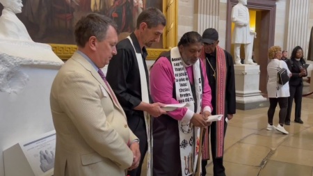 The Rev. William Barber II and other progressive Christian activists stage a prayer rally at the Capitol Rotunda in Washington, D.C. on Monday, April 28, 2025. Minutes into the event, Barber and two others were arrested for staging an unlawful assembly. 