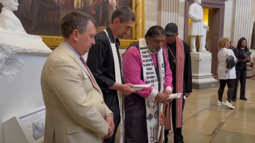 The Rev. William Barber II and other progressive Christian activists stage a prayer rally at the Capitol Rotunda in Washington, D.C. on Monday, April 28, 2025. Minutes into the event, Barber and two others were arrested for staging an unlawful assembly.