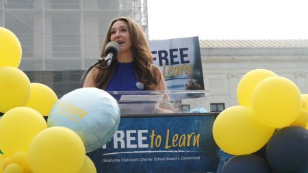 Kandice Jeske speaks during a Free to Learn rally outside of the U.S. Supreme Court on April 30, 2025, as the justices heard arguments in "Oklahoma Statewide Charter School Board v. Drummond."