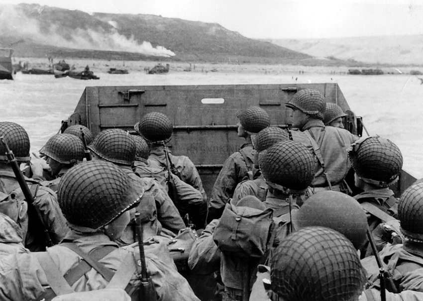 American soldiers in a landing craft approaching Omaha Beach during the landings at Normandy, France on "D-Day", June 6, 1944.