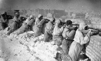 Red Army soldiers fighting on the roof of a house at the battle of Stalingrad during World War II.