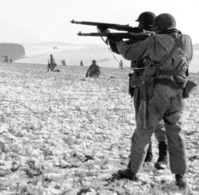 American soldiers near Bastogne during the Battle of the Bulge, a major battle that took place during World War II, from December 1944 to January 1945.