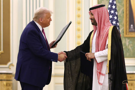 U.S. President Donald J. Trump and Saudi Crown Prince Mohammed bin Salman attend a signing ceremony at the Saudi Royal Court on May 13, 2025, in Riyadh, Saudi Arabia. Trump begins a multi-nation tour of the Gulf region focused on expanding economic ties and reinforcing security cooperation with key U.S. allies.