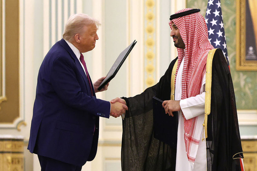 U.S. President Donald J. Trump and Saudi Crown Prince Mohammed bin Salman attend a signing ceremony at the Saudi Royal Court on May 13, 2025, in Riyadh, Saudi Arabia. Trump begins a multi-nation tour of the Gulf region focused on expanding economic ties and reinforcing security cooperation with key U.S. allies.