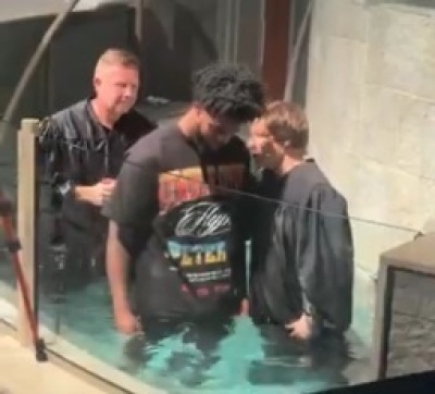 A Dallas Cowboys rookie wide receiver Traeshon Holden is being baptized in a video he posted on June 22, 2025.