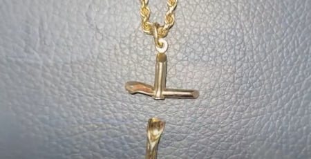 A cross necklace credited with saving Aidan Perry, 20, from a potentially fatal gunshot wound remains intact although the cross itself is broken. 