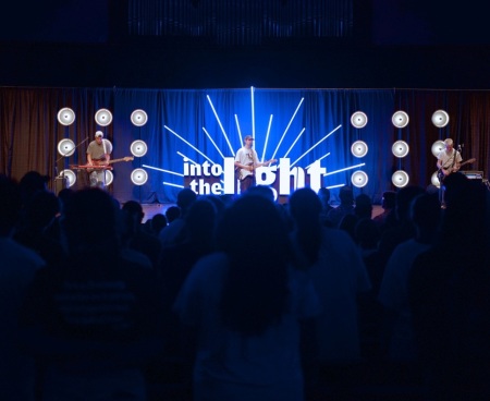 Students attend a worship service tied to MFuge Camps. 