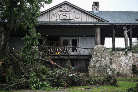 A view of Camp Mystic, the site of where initially over 20 girls went missing after flash flooding in Hunt, Texas, on July 5, 2025. That number went down to 10 by late afternoon Sunday. Rescuers continue searching for the girls missing from a riverside summer camp in Texas, after torrential rains caused devastating flooding that killed at least 82 people -- with more rain on the way. 