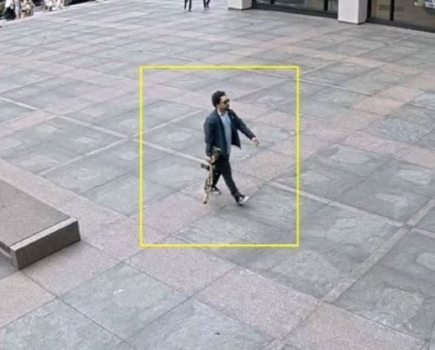 Shane Tamura, the 345 Park Avenue shooter, walks outside before entering the building in New York City on July 28, 2025. 